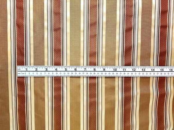 Rust, Tan, and Gold Striped Silk-Blend Taffeta Fabric by Kravet Couture with ruler